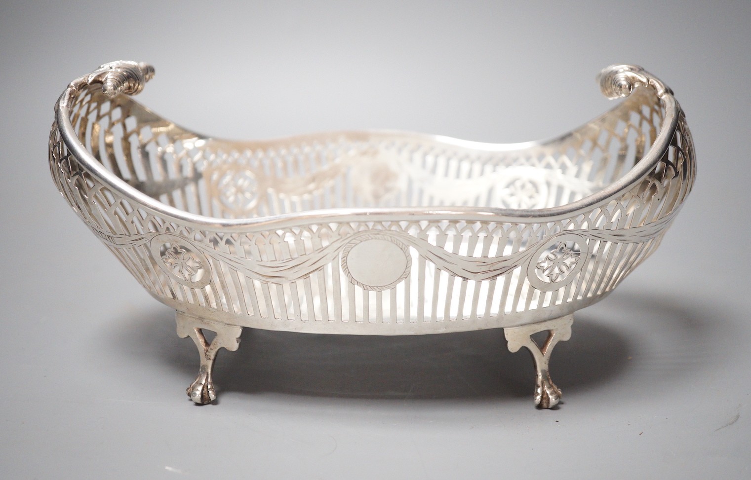 A George V pierced silver boat shaped dish, Carrington & Co, London, 1910, 23cm, 13.4oz.